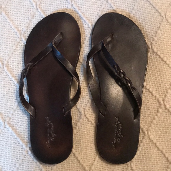 dark brown leather flip flops